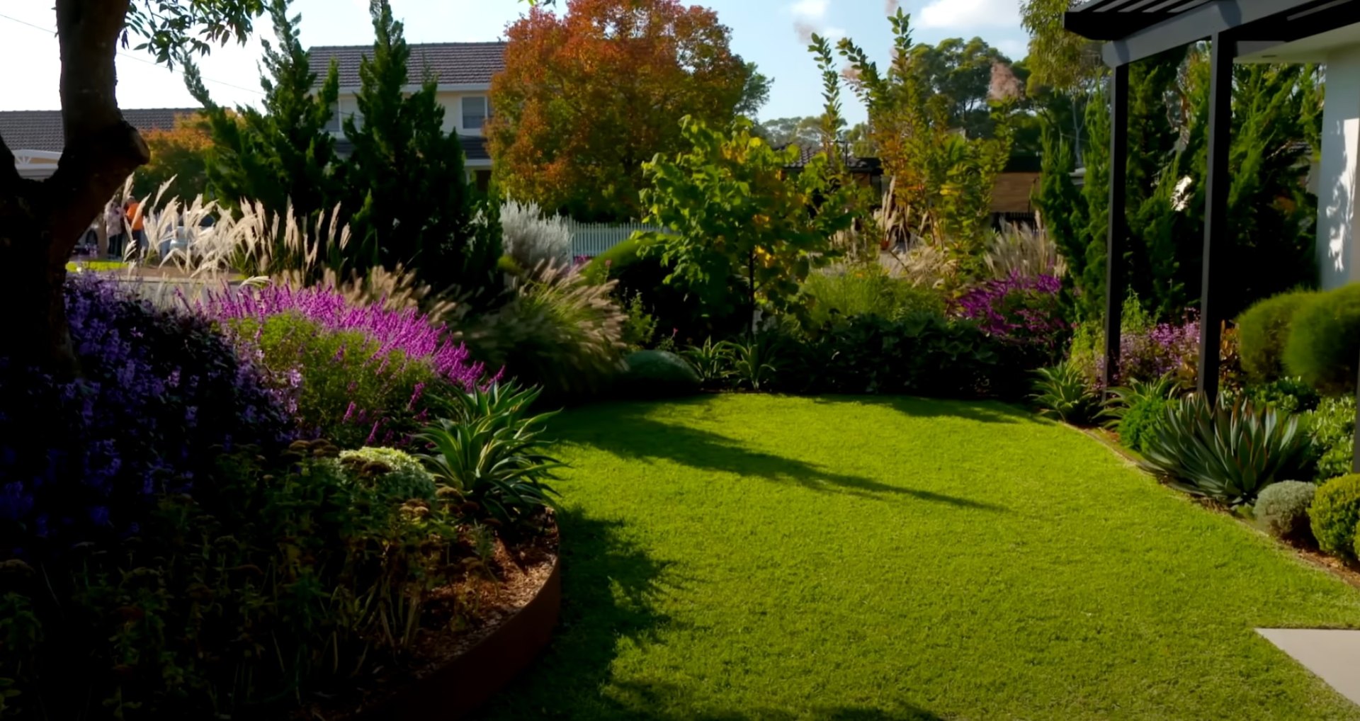 Professional landscape design with carefully selected plants in San Leandro Beautiful residential landscape with lush plantings and modern design